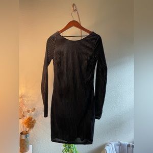 Black pinstripe felt dress.